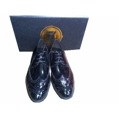 Shiny Black Brogues