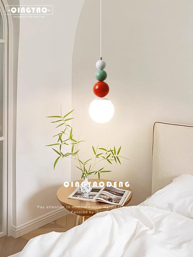 Bedside LED small chandelier in the bedroom