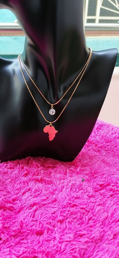 18 Karat Gold Plated 2 Step Necklace With 2 Pendants