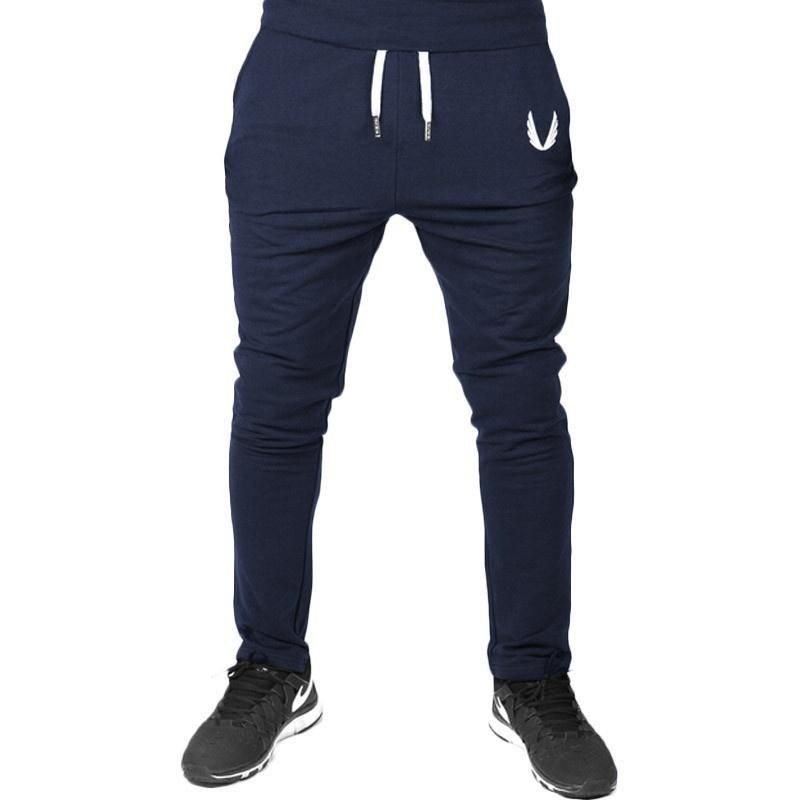 Informal elastic sports pants for men meshes with pockets for gym for running training
