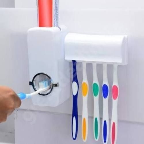 Toothpaste Dispenser And Toothbrush Holder