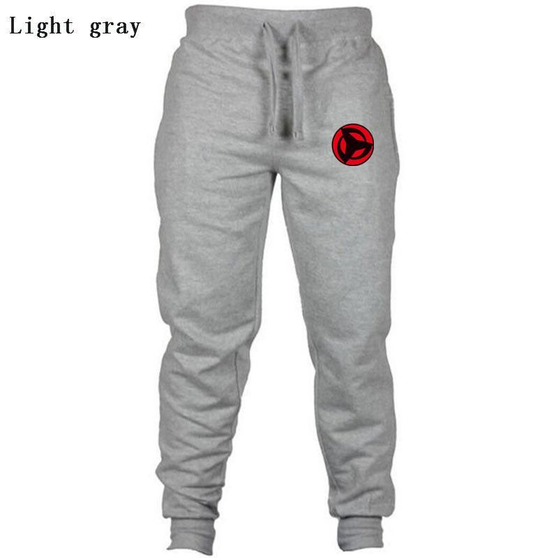 Candy tracksuit pants with man drawing Casual black pants adjusted for fitness big size wholesale autumn