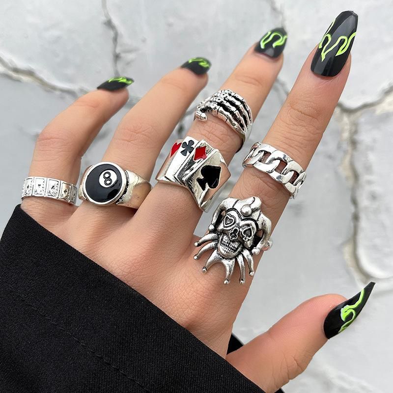 Girls ring Alloy chain ring Retro Cry Face ring 9-piece poker ring hollow heart ring